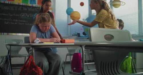 Sad School Girl Crying Suffering From School Bullying Peer Harassment From Classmates