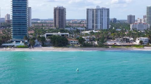USA Travel Destination Miami Skyline with Ocean Cruise Liner Departing From Port