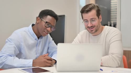 Team Working Together Using Laptop for Video Call