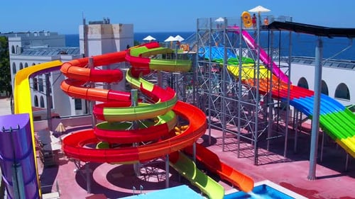 Colorful Water Park Slides on Sunny Tropical Day