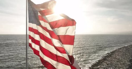 American Flag Waves near the Ocean