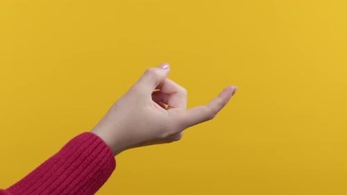 Unrecognizable Woman Giving Beckoning Finger Sign