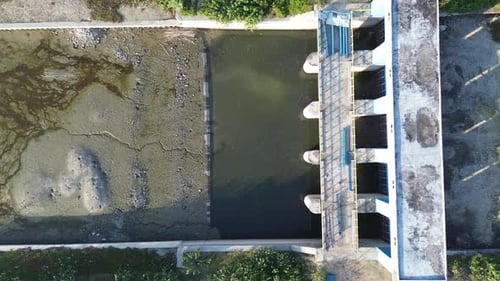 aerial view of the water in a dry dam due to drought