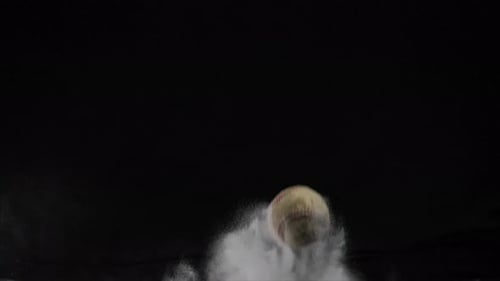 Baseball Strikes Powder Mound in Slow Motion