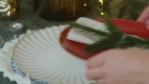 Holiday Table Setting with Decorative Branch and Napkin