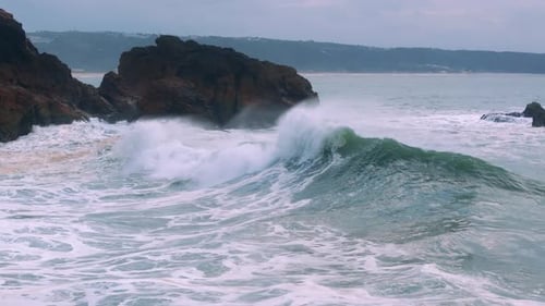 Ocean Waves Crashing Against Coastal Cliffs