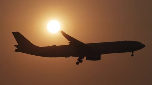 Passenger Airplane Silhouette Before Landing