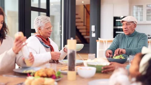 Multi-Generational Family Eating Together at Home