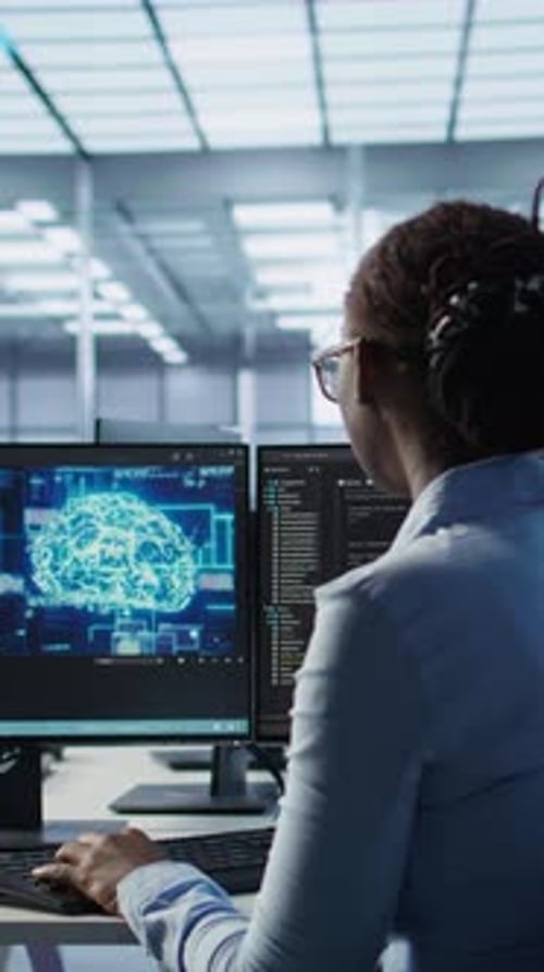 Technician Inspects Rackmounts in Server Room Using Artificial Intelligence Tech