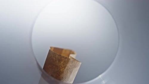 Slow Motion Closeup Video of Pouring Coffee Beans Into a Coffee Grinder