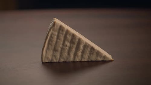 Close Up Cheese Wedge Picked Up
