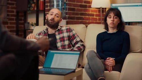 Couple Attends Therapy Session in Counseling Office