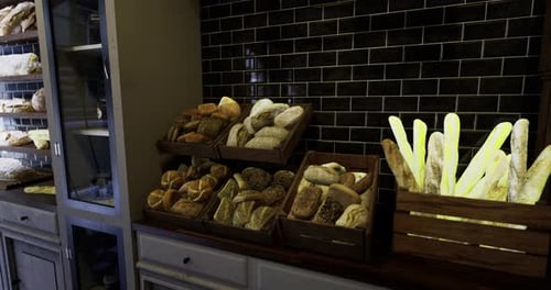 Freshly Baked Bread Displayed in a Cozy Bakery Setting