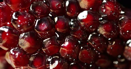 Extreme macro of juicy pomegranate, rich in natural antioxidants. concept of red fruits, vitamins