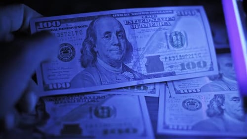 Examining United States Hundred Dollar Bills with UV Light
