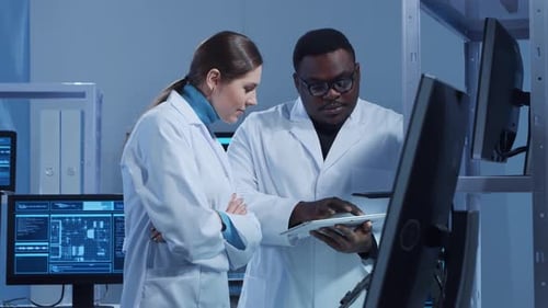 Scientists Collaborating in a Modern Laboratory Setting