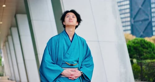 Building, traditional clothes and Japanese man in city, fashion and traveller with culture on trip