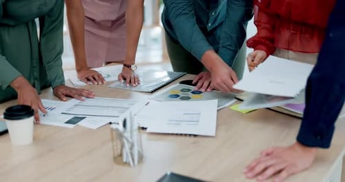 Business team brainstorming strategy in an office setting