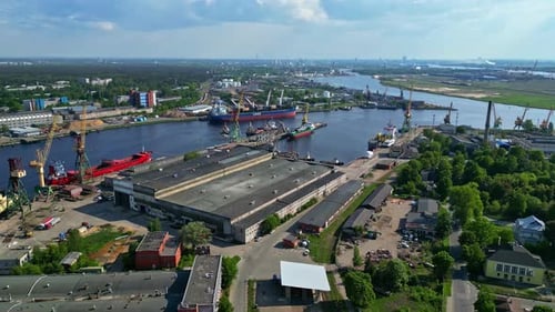 Panoramic aerial view of Riga harbor with vessels and buildings
