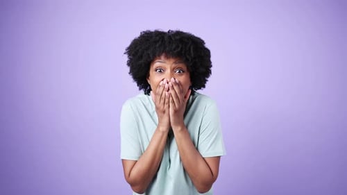 Excited African American Woman Celebrating Success in Slow Motion
