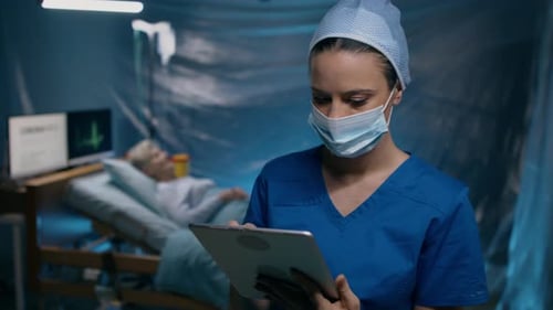 Doctor Holding Tablet in Hospital, Coronavirus Concept