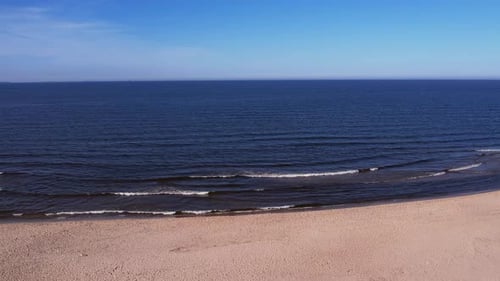 Drone Aerial View of Waves Sea Ocean Coast Beach and Dunes Dark Calm Sea Waves Nature Landscape