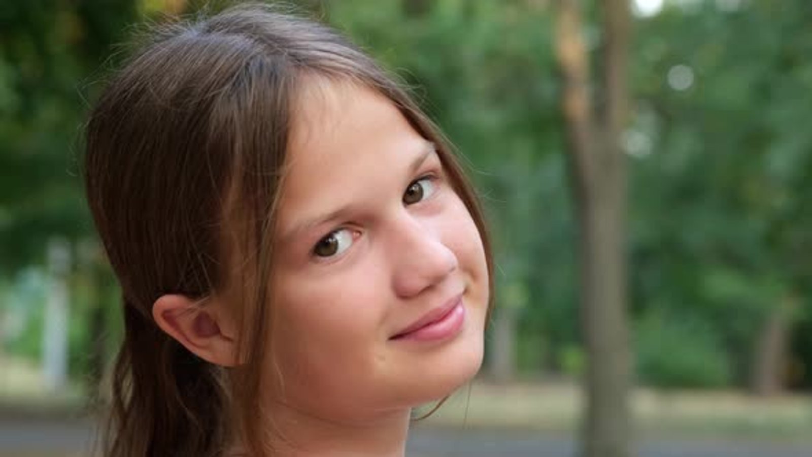 preteen models Close Up Portrait of Preteen Girl in Park Face of Smiling Kid Looking at Camera, People Stock Footage ft. child & smile - Envato