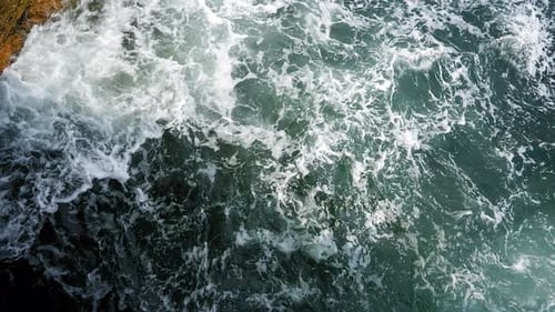 Sea Waves Wash Over the Rocks Storm and Bad Weather at Sea in Super Slow Motion