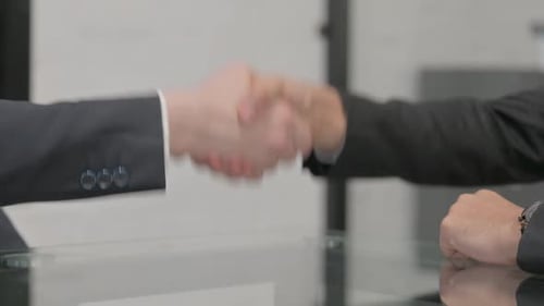 Close up of Business People Shaking Hand