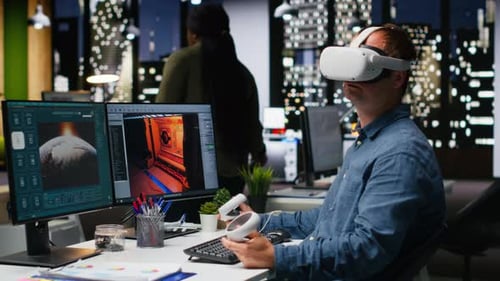 Professional Male Developer Operating VR Glasses to Create Spaceship Station