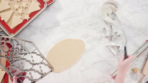 Rolling Dough for Holiday Sugar Cookies at Home