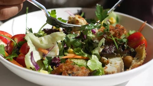 Cutting into a Fresh and Healthy Salad