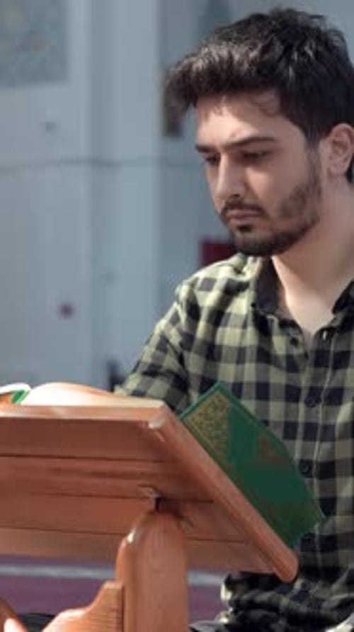 Muslim Young Man Reading Quran Mosque
