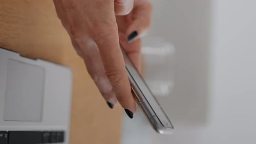 Closeup Businesswoman Fingers Messaging Phone at Office Woman Texting Vertical