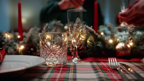 Christmas Dinner Table Setting with Toasted Drinks