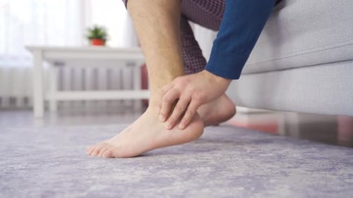 Man experiencing joint pain.
