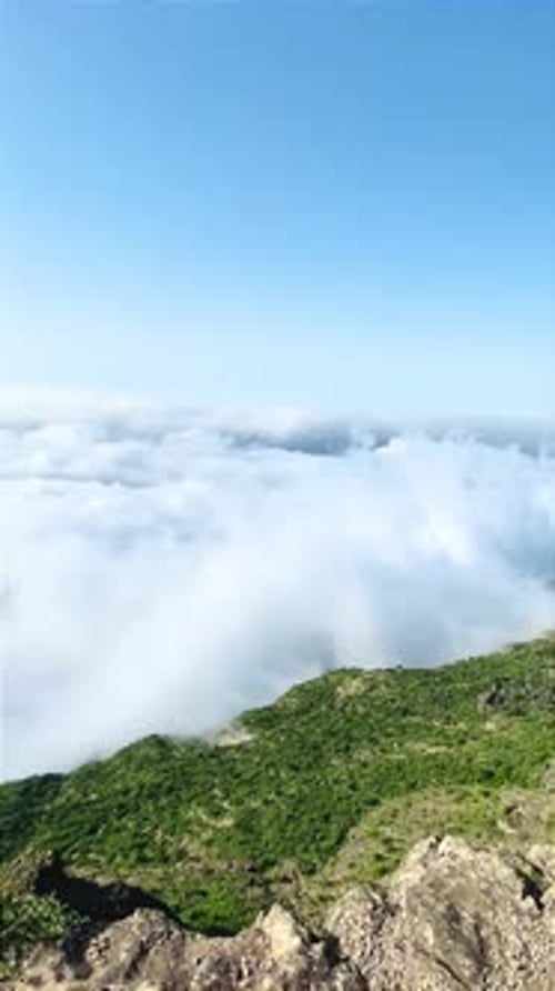 Breathtaking Mountain Cliff Above the Clouds