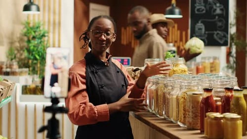 Woman Promoting Food Products at Store via Video