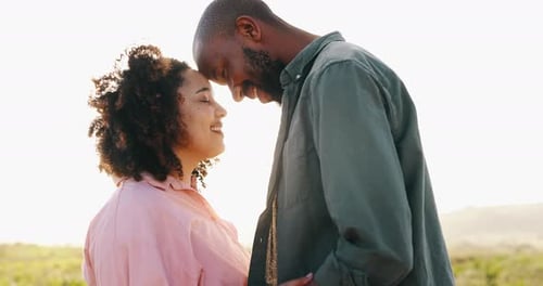 Affectionate Couple Sharing a Loving Moment Outdoors