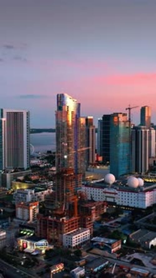Approaching the stunning skyscrapers in the beautiful light of setting sun. Miami, Florida, USA.