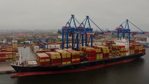 Cargo ships waiting for unloading in large container port in Hamburg
