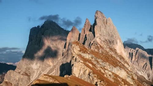 Beautiful sunlight breaks through the clouds. Outstanding hills of the Seceda dolomite mountains