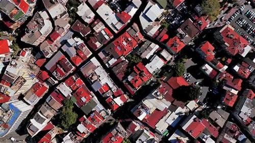 Sunny morning white buildings neighborhood red roof Istanbul Turkey Türkiye aerial drone Birdseye