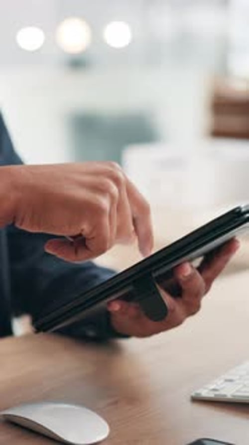 Browsing, tablet and review of article, office and writer with information for story and journalism