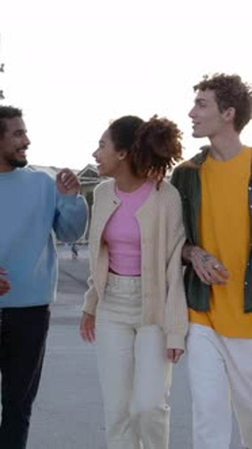 Friends Walk and Talk in Urban Setting