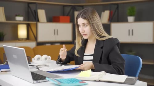 Businesswoman in online meeting.