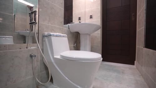 Modern White Toilet in Minimalist Bathroom Interior