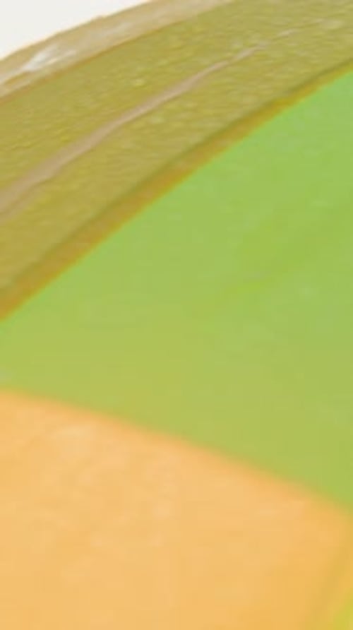 Colorful Umbrella in Rain Close-Up