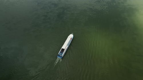 Aerial Drone Above View White Boat Move Green Water Surface Ship Sailing Lake