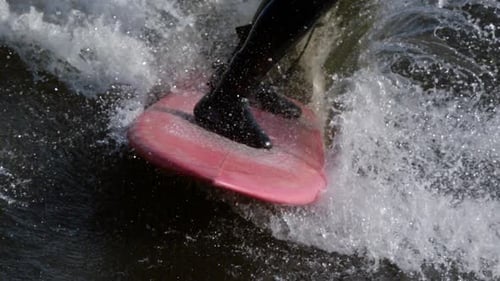 Close-Up Skimboarding Water Sport on Ocean Waves